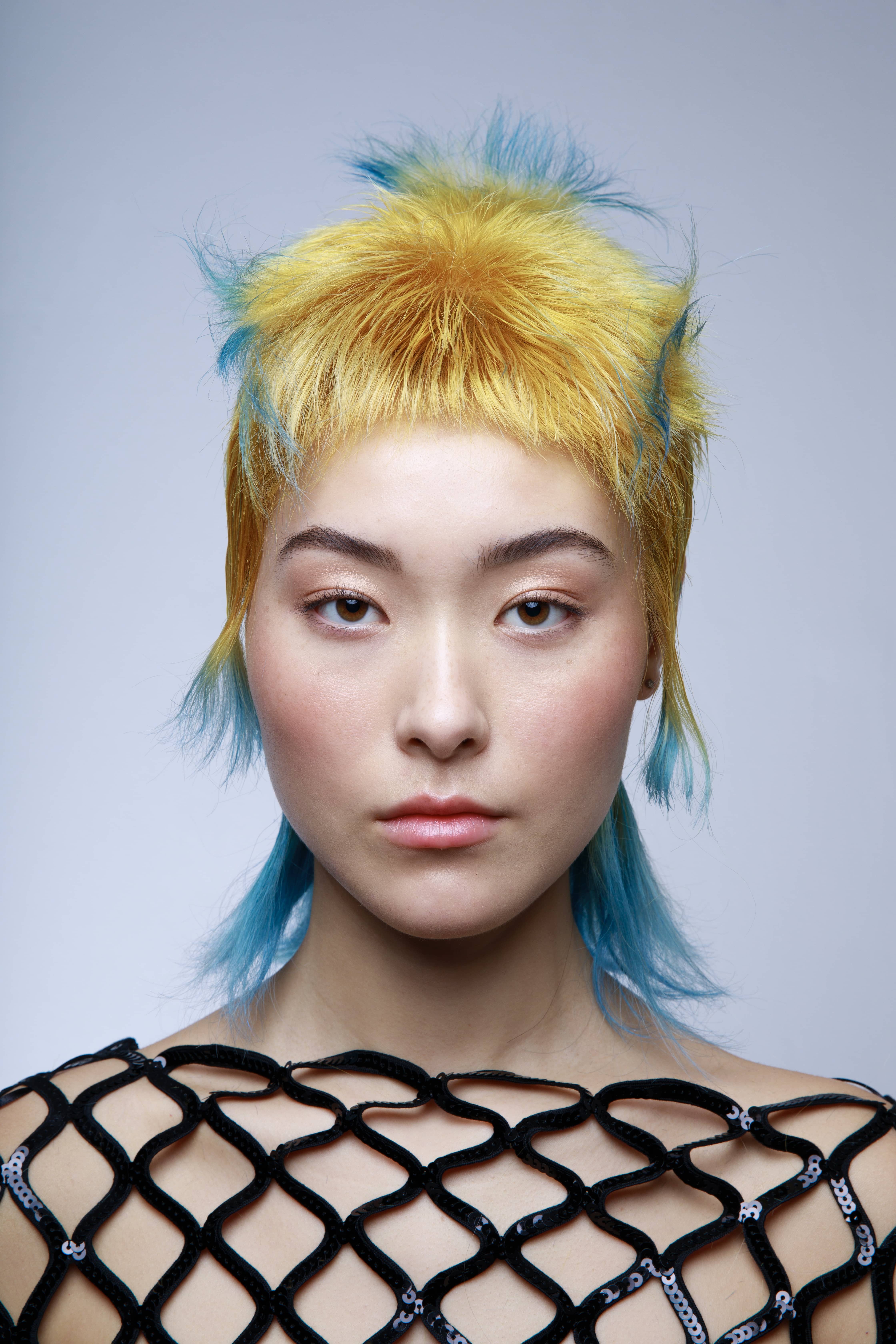 Woman with yellow and blue hair