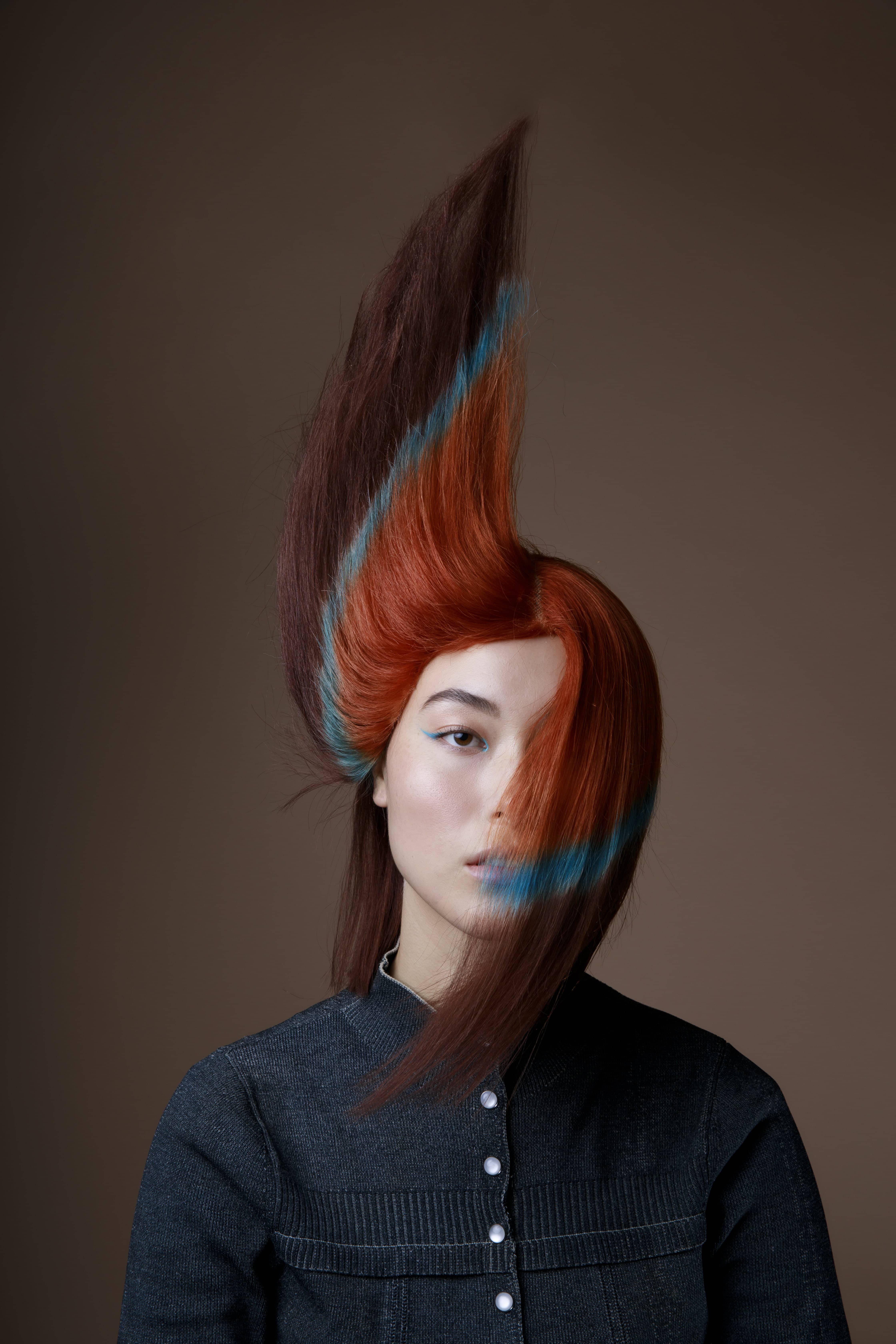 Woman with red, blue, and brown hair