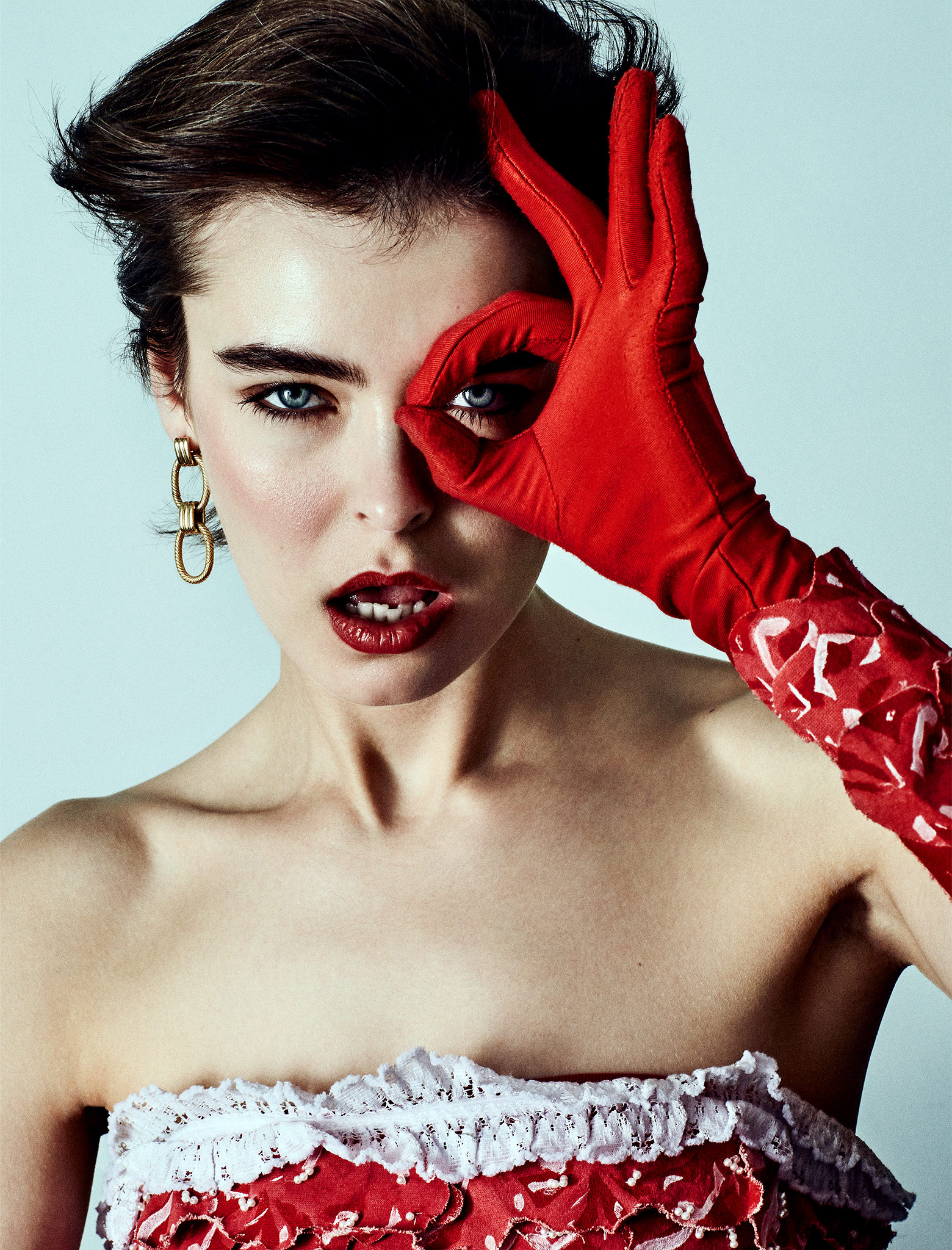 Woman with red glove