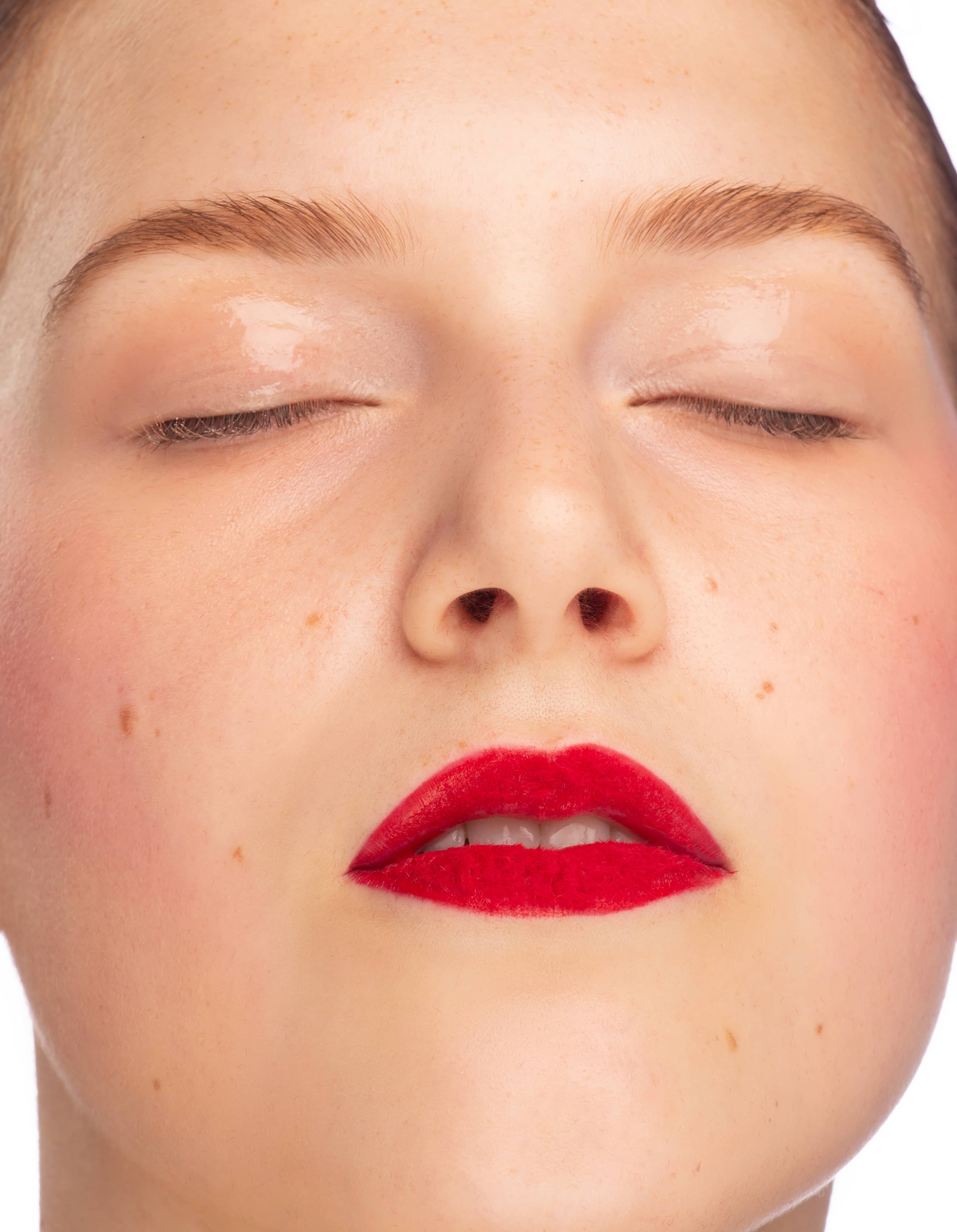 Woman with red lipstick, closeup