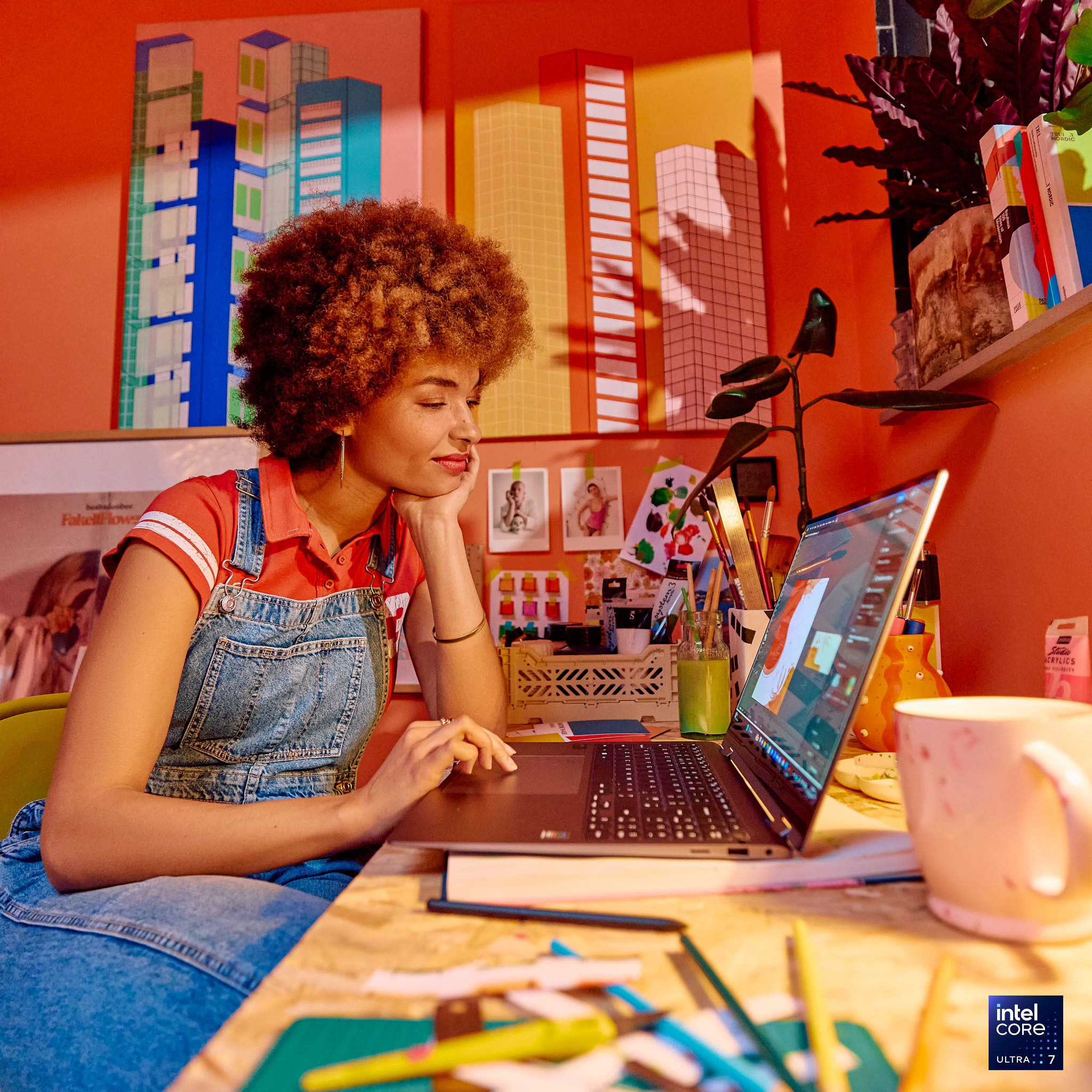 Woman in colorful room working at a desk