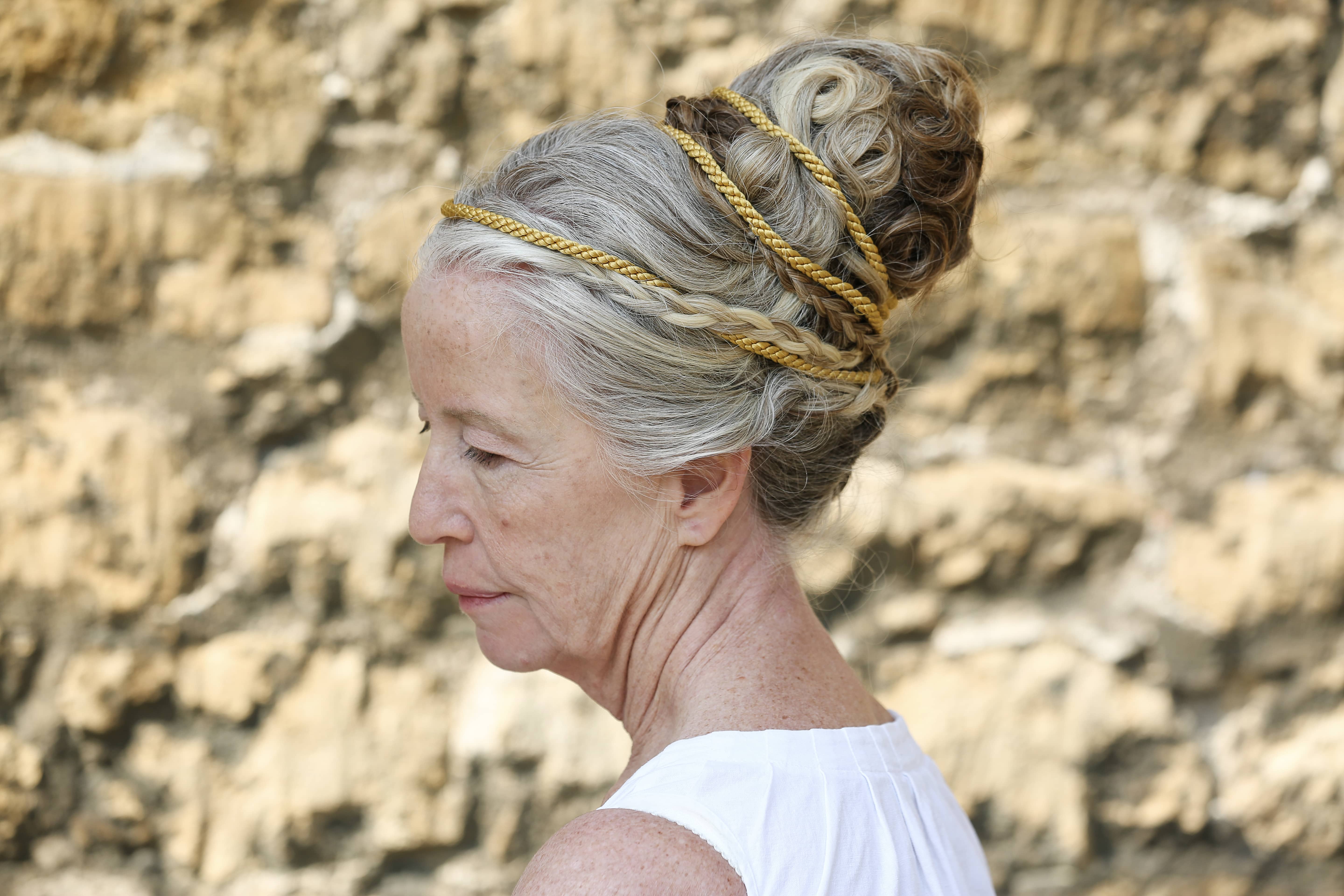 Woman with grey hair, tied up